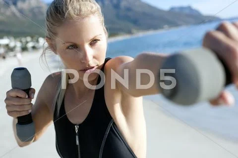 Woman exercising Stock Photos