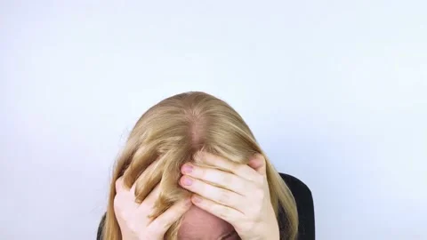 The woman is experiencing a panic attack. The concept of phobia, fears, paranoia Stock Footage 160885797