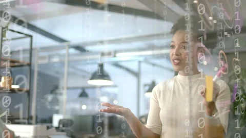 Woman explaining tech idea at glass following peer question, binary icons Stock Footage 335739504