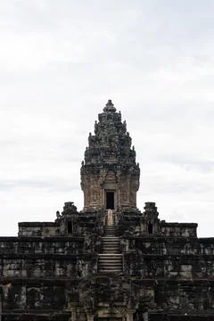 Woman exploring ancient angkor temple ruins in cambodia Stock Photos