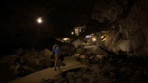 Woman exploring Thai Cave Stock Footage 104125784