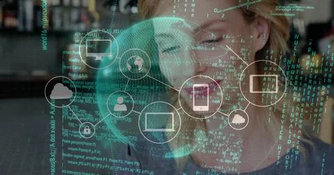 Woman with eyeglasses analyzing code under lit data overlay at cafe counter, Stock Photos