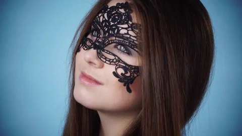 Woman face with black carnival mask 4K Stock Footage