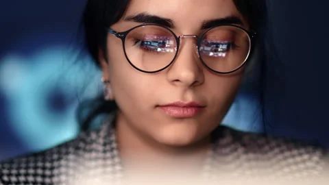 Woman face eyeglasses hacker programmer developer working laptop futuristic Stock Footage 262980507
