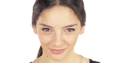 Woman Facing Camera Close up on White, Video for advertisement Stock Footage 52017656