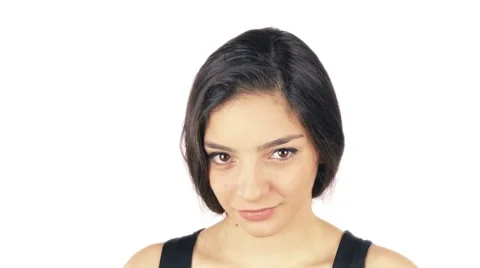 Woman Facing Camera Close up on White, Video for advertisement Stock Footage 52017751