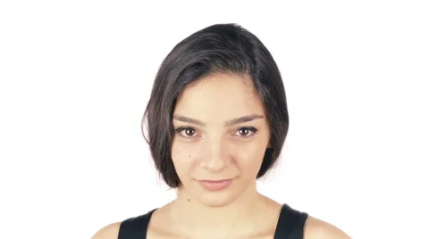 Woman Facing Camera Close up on White, Video for advertisement Stock Footage 52018093