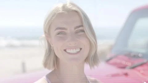 Woman facing camera shifting from blur to smile as scanlines briefly obscuring Stock Footage 333873698