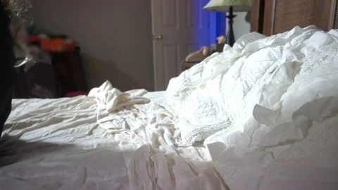 Woman falling on bed dead Stock Footage 105860167
