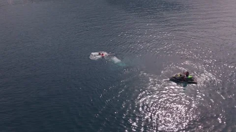 Woman Falling into the Sea While Flyboarding, Aerial View Stock Footage 344634621