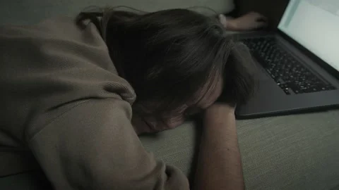 Woman falls asleep while working late at night Stock Footage 180172790