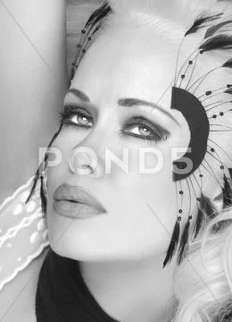 Woman with feathers Stock Photos
