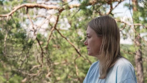 Woman feeling sadness while looking at nature Stock Footage 314301845