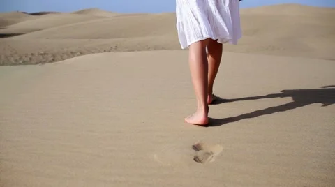 Woman feet walking on the desert HD Stock Footage
