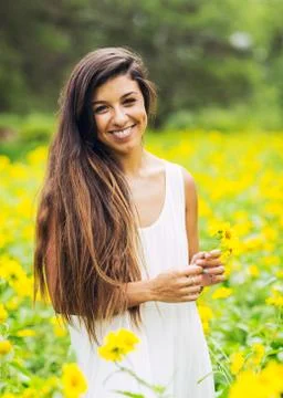Woman in field of flowers Stock Photos