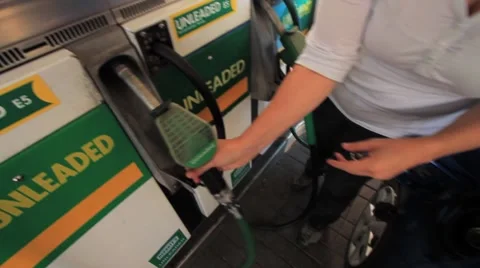 Woman Fills Car at Gas Station with Gas or Petrol GFHD Stock Footage
