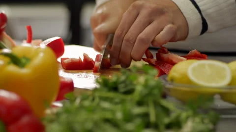 Woman Finely Chops a Red Bell Pepper Stock Footage 59348480