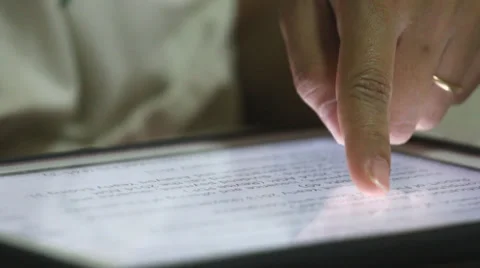 Woman finger touching tablet computer touchscreen. Stock Footage 37610751