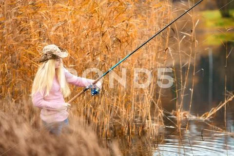 Woman fishing Stock Photos