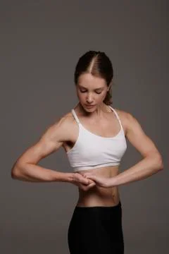 Woman flexing Stock Photos