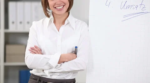 Woman with flipchart while standing alongside it Stock-Footage 25210545