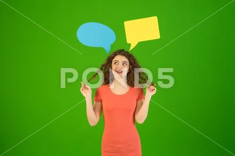 The woman flirt near a dialog signs on the green background Stock Photos