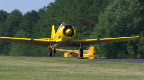 Woman Flying a North American T-6 - Take Off Stock Footage