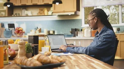Woman focused on programming and software development tasks Fotos Stock