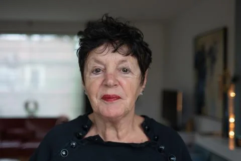 Woman in front of camera Stock Photos