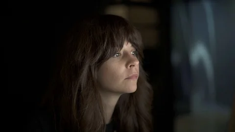 Woman in front of the screen of the computer working late at night Stock Footage 122287787