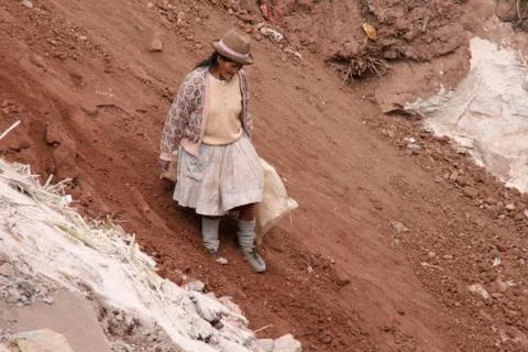 Woman on a garbage dump Stock Photos