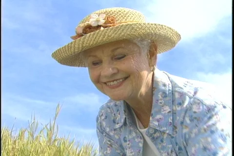 Woman in the garden (close) Stock Footage