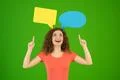 The woman gesture near a dialog signs on the green background Photo