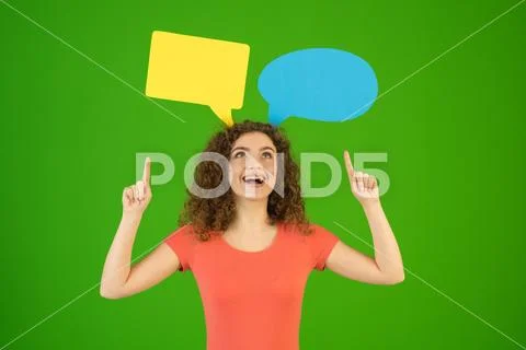The woman gesture near a dialog signs on the green background Stock Photos