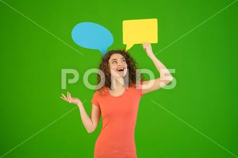 The woman gesture near a dialog signs on the green background Stock Photos