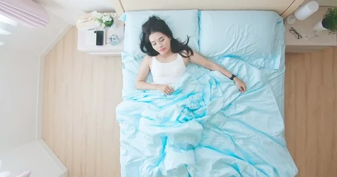 Woman get up from bed Stock Footage 119618102