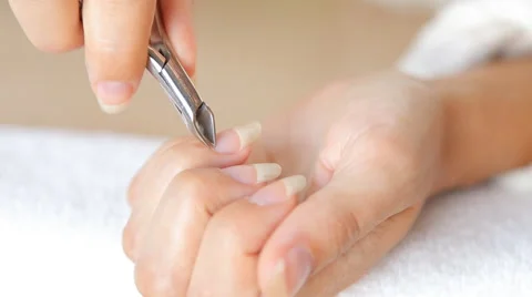 Woman getting a manicure at nail salon in high quality Stock Footage