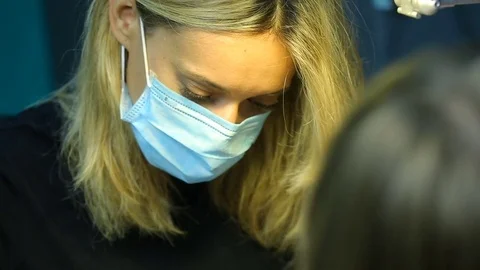 Woman getting nail manicure Stock Footage