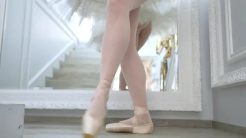 Woman is getting ready to dance in her ballet shoes Stock Footage 300660796