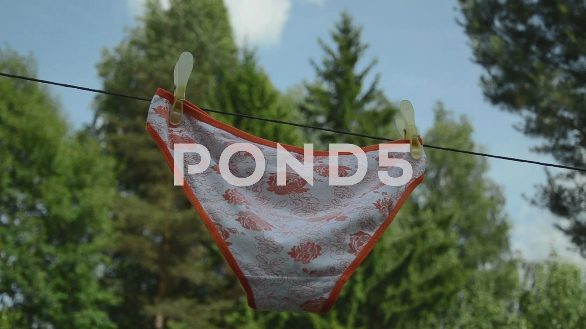 Woman girl panties hang dry on rope clip, Stock Video