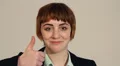Woman gives a thumbs up HD Footage