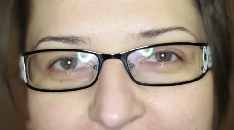 Woman With Glasses Looking At The Camera Stock Footage 47017801