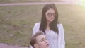 The woman in glasses standing with a disabled person 4k or 4k+ Resolution