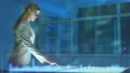 The woman in glasses working with a virtual screen on the hologram background 4k or 4k+ Resolution