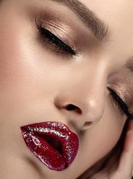 Woman with glittery red lips closeup portrait Stock Photos