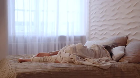 Woman is going to awake Stock Footage 229549443