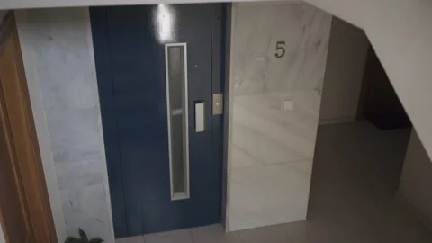 Woman going out from elevator Stock Footage 132058375