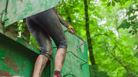 Woman going through obstacle course Stock Footage 40705249