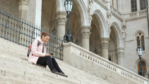 Woman on gothic steps. Stock Footage 250236581