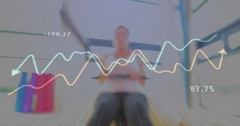 Woman grasping rowing machine bar and pulling while fitness overlay rising then Stock Footage 312040407